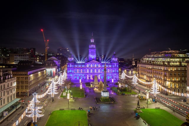 The bright lights fall over Glasgow City Centre with illuminations and lasers used to lift festive spirits in George Square.