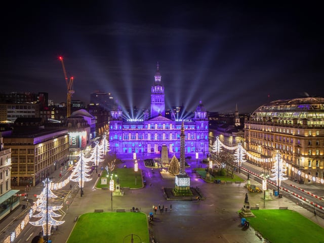 The bright lights fall over Glasgow City Centre with illuminations and lasers used to lift festive spirits in George Square.