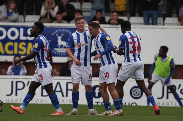 Hartlepool United's Luke Molyneux celebrates with his team mates after scoring their first goal during the Sky Bet League 2 match between Hartlepool United and Exeter City at Victoria Park, Hartlepool on Saturday 25th September 2021. (Credit: Mark Fletcher | MI News)