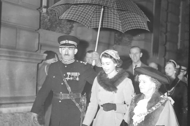 Queen Elizabeth II outside Sunderland Town Hall in October 1954 accompanied by civic dignitaries.