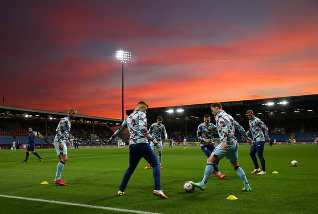 BURNLEY, ENGLAND - SEPTEMBER 21: Players of Burnley warm up ahead of the Carabao Cup Third Round match between Burnley and Rochdale at Turf Moor on September 21, 2021 in Burnley, England. (Photo by Alex Livesey/Getty Images)