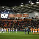The players of Sheffield United and Blackpool pay tribute to the memory of the legendary Pele before the match at Bloomfield Road