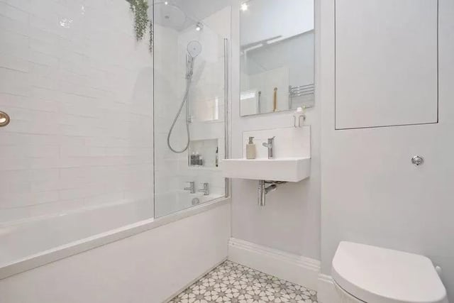The family bathroom has a similar modern finish to the rest of the house.