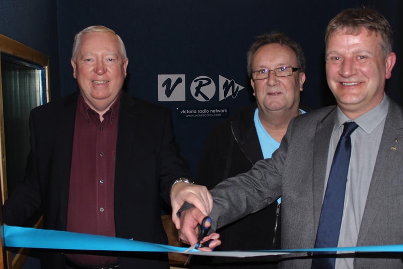 Dave Stewart (NHS), Bob Small (former VRN Chairman) and David Torrance MSP celebrate Victoria Radio Network's online streaming of the service for the first time, and the reopening of one of their studios after refurbishment.