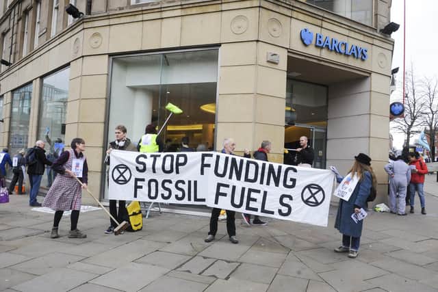 Protesters outside Barclays Bank on Pinstone Street in Sheffield.