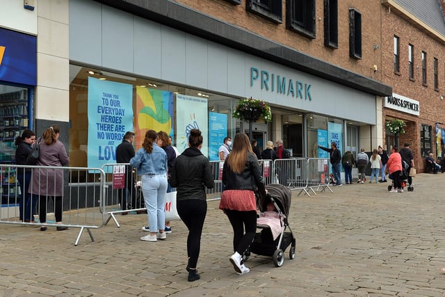 Shoppers que to get into Primark.
