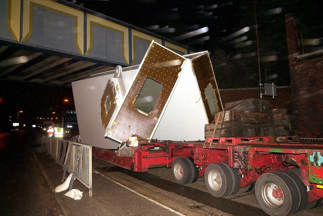 18th November 2003. The cruciform for The Spinnaker Tower arrives in Portsmouth but needs great care as it goes under the railway bridge in Anglesea Road to turn into Park Road. PICTURE: MALCOLM WELLS (035785-42)