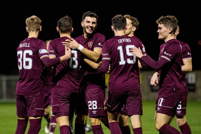Hearts players celebrate Ollie Lee's first goal.  (Photo by Ross Parker / SNS Group)