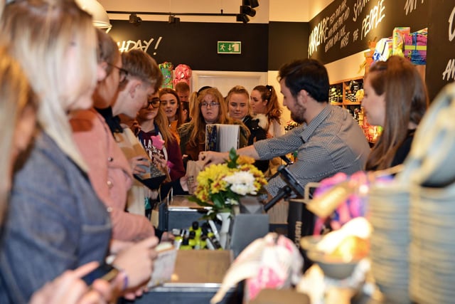Students picking up bargains in Lush. Who do you recognise?