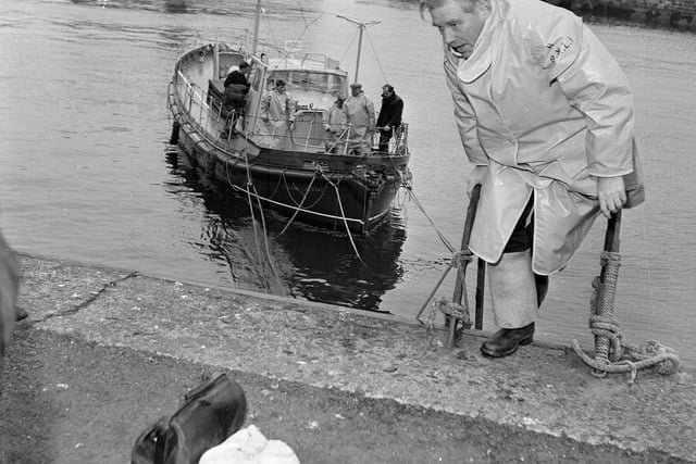 Dr AE Cordin at Dunbar Harbour after the lifeboat and trawler dash in December 1964.