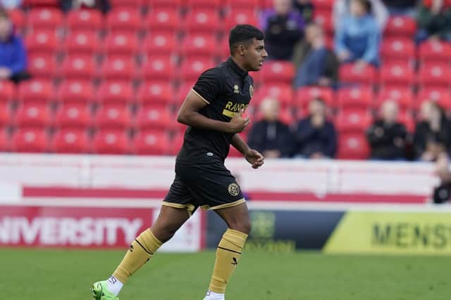 Sai Sachdev comes on for his debut for Sheffield United: Andrew Yates / Sportimage