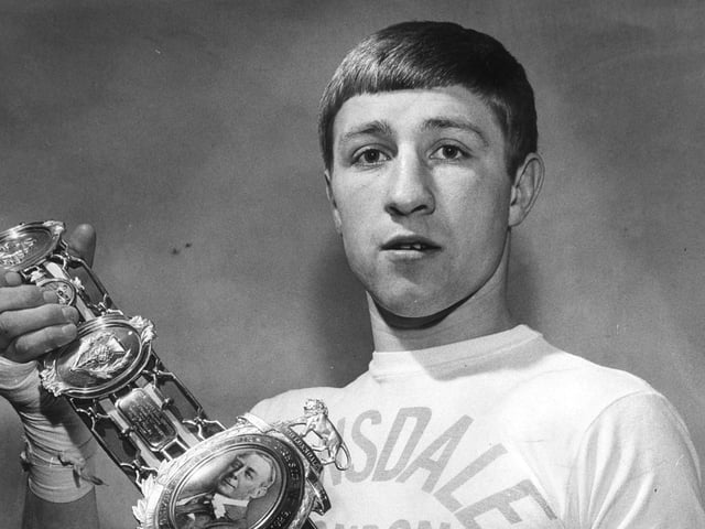 Ken Buchanan holding a Lonsdale Belt as a British Boxing Champion in 1968.