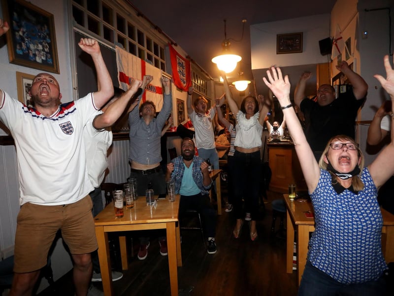England fans pictured at the Artillery Arms in Portsmouth, UK, watching England play on TV in the Semi-finals at Wembley. Pictured are fans enjoying the night. Picture: Sam Stephenson