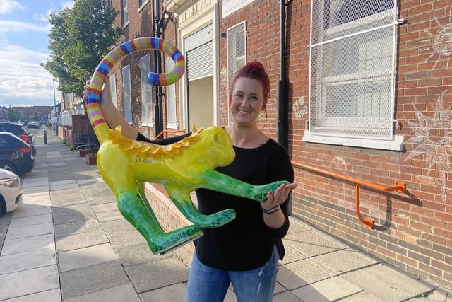 Jade Bromley outside the Wharton Trust with the monkey she painted in memory of Annexe worker Teresa Driver. Picture by FRANK REID