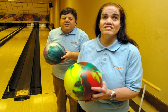 Blind bowler Catherine Harris and her husband, Mike, pictured in their 'magic love bird' shirts at the Fastlane Bowl in 2006
