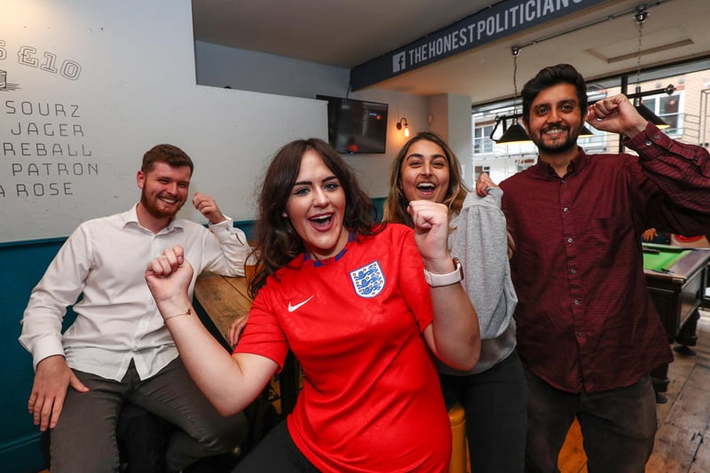 England fans watch England beat Germany 2-0 in the Euros 2020. Fans pictured in the Honest Politician pub. Tom Pottle, Ellie Harrison, Henna Tank and Siraaj KHurram. Picture: Stuart Martin (220421-7042)