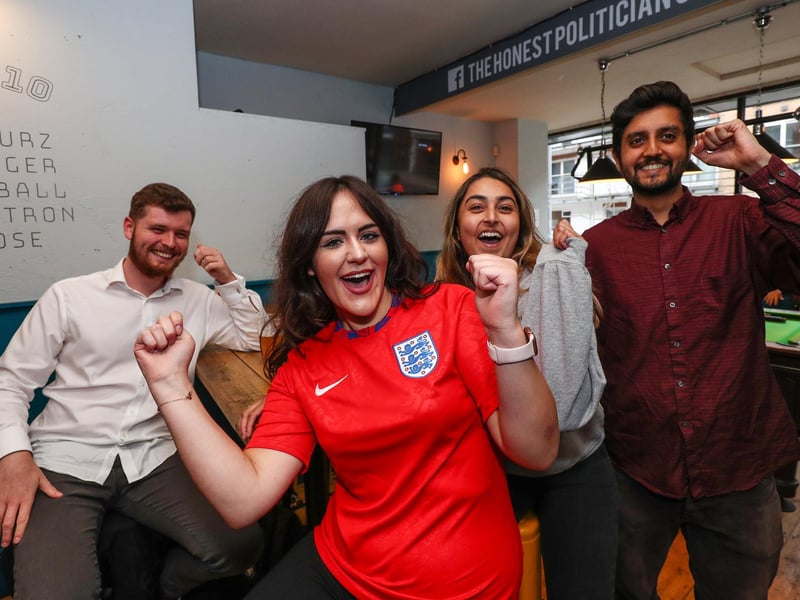England fans watch England beat Germany 2-0 in the Euros 2020. Fans pictured in the Honest Politician pub. Tom Pottle, Ellie Harrison, Henna Tank and Siraaj KHurram. Picture: Stuart Martin (220421-7042)