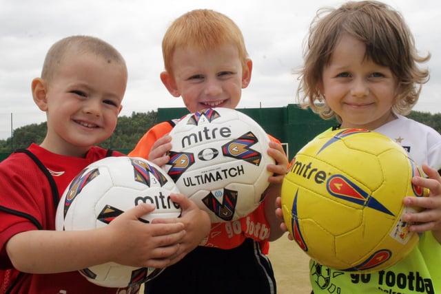 Jake Hewitt, Troy Tomlin and Lucy Green all ready for Bolsover nursery's mini-world cup tournament in 2006.