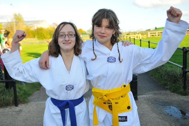 English Martyrs School pupils Ola Filipczak (left) and Ffion Lanigan who were about to set off on the school's Children In Need fun run seven years ago.