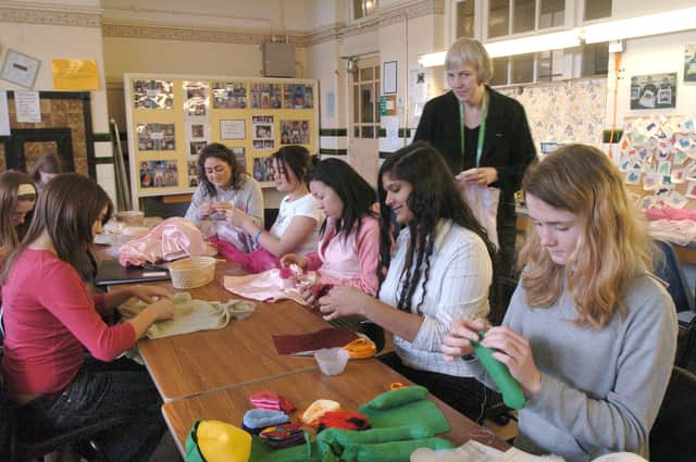 Pictured  at  High Storrs school,  Sheffield, where teacher Jenny Cross is seen working with pupils in the GCSE Textile Technology class, during the Easter holiday break.