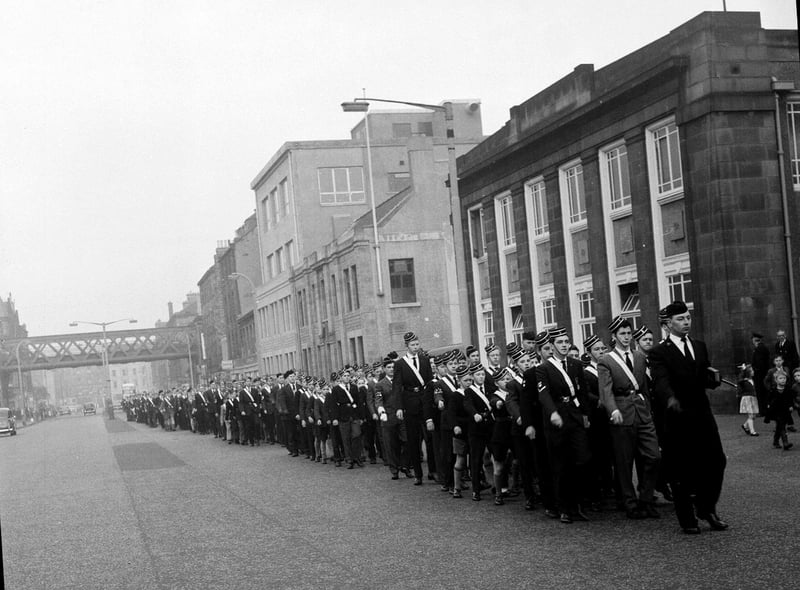 The Leith Battalion of the Boys Brigade are pictured taking part in their autumn church parade on Leith Walk in November 1962.