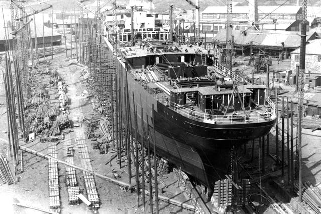 Who can tell us more about this undated photo of a shipyard scene?