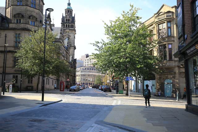 Historic Surrey Street in Sheffield showing the former Halifax on the right and the town hall on the left. Picture: Chris Etchells