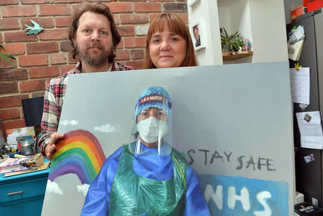 Sheffield artist Andrew Hunt painted his wife Kate an ENP in Sheffield's A&E department to create a work of art that captures the moment. Andrew and Kate Hunt with the painting.