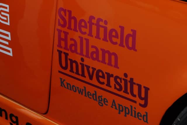 Sheffield Hallam logo on the car