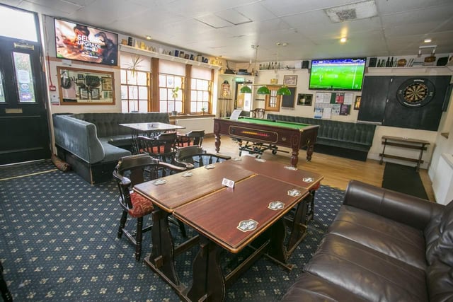 The public bar currently houses a pool table and dartboard
