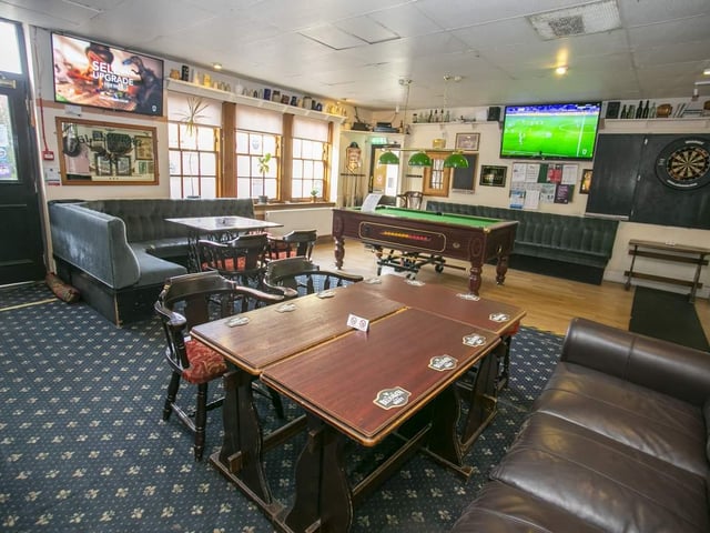 The public bar currently houses a pool table and dartboard