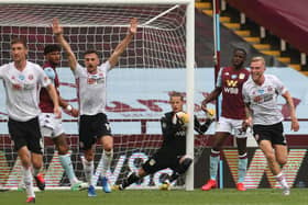 Oliver McBurnie and Jack Robinson of Sheffield United appeal for a goal after Orjan Nyland of Aston Villa took the ball over the line (Carl Recine/Pool via Getty Images)