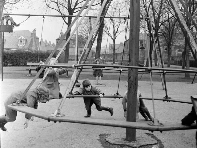 Children playing on the roundabout in St Margaret's Park Corstorphine in 1964.