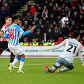 Sheffield United captain Billy Sharp scores against Huddersfield Town: Lexy IIsley/ Sportimage