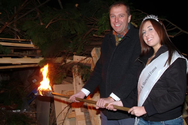 Miss Mansfield helps to light the impressive bonfire.