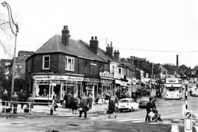 A view of the shops at Firth Park including Granny Smith's fruit and flowers and J H Watson, meat purveyors, in the late 1970s/early 1980s