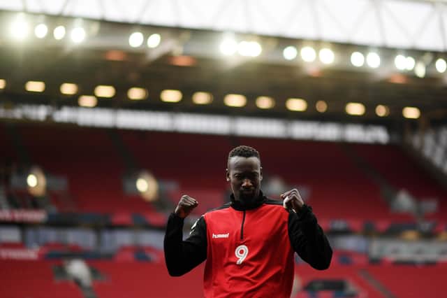 BRISTOL, ENGLAND - DECEMBER 26: Famara Diedhiou of Bristol City warms up prior to the Sky Bet Championship match between Bristol City and Wycombe Wanderers at Ashton Gate on December 26, 2020 in Bristol, England. The match will be played without fans, behind closed doors as a Covid-19 precaution. (Photo by Harry Trump/Getty Images)