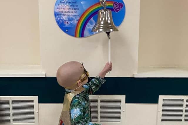 This picture shows the moment little Jude Mellon-Jameson celebrated the end of his radiotherapy treatment for a rare cancer at Sheffield’s Weston Park Hospital.