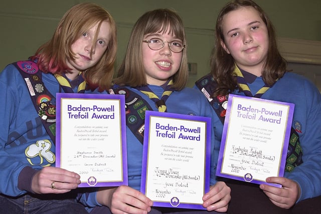 Members of the 24th and 42nd (All Saints) Doncaster Guides Association were presented with Baden Powell Trefoil awards in 2001. Our picture shows recipients, from left, Stephanie Smitgh, aged 13, of Intake, Jenny Oliver, also aged 13, of Edenthorpe, and Kimberley Padgett, aged 14, of Armthorpe, with their awards.