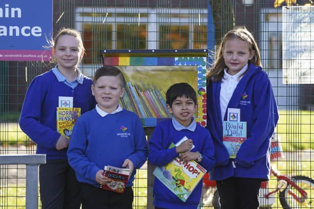 Little Library at Windmill Hill Primary school in Chapeltown. Left to right: Lydia, Oliver B, Oliver K, and Millie. Picture Scott Merrylees
