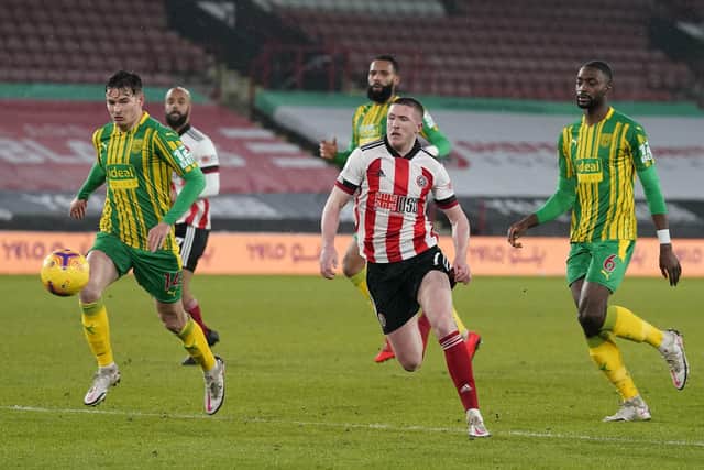 John Lundstram in action during Tuesday night's win over West Bromwich Albion: Andrew Yates/Sportimage