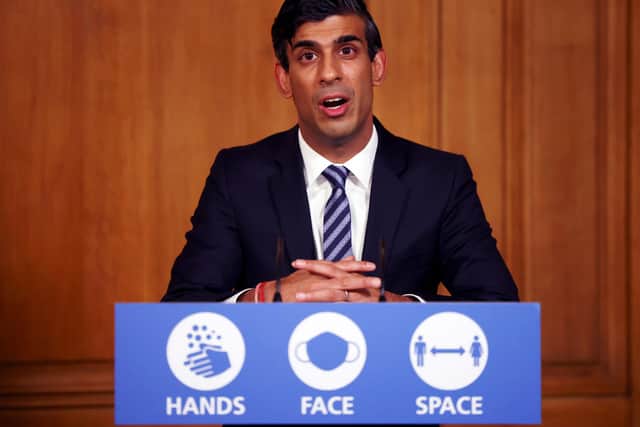 Britain's Chancellor of the Exchequer Rishi Sunak speaks during a virtual press conference on the coronavirus pandemic inside 10 Downing Street (Photo by HENRY NICHOLLS/POOL/AFP via Getty Images)