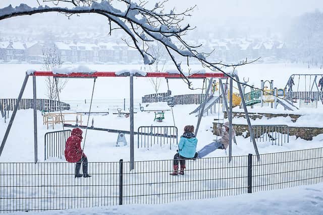 A snowy day at Endcliffe Park playground.