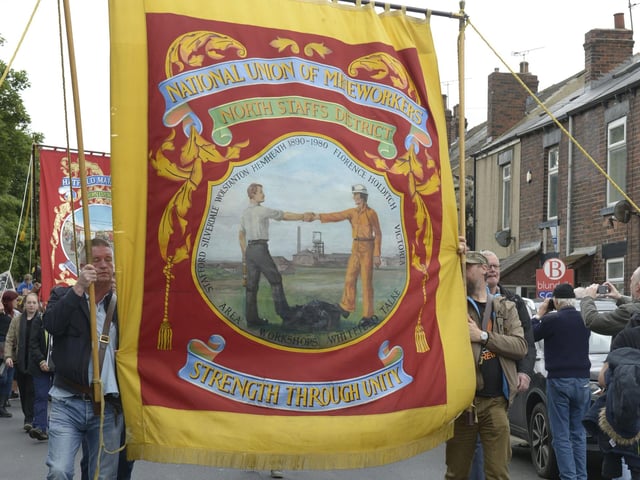NUM banners on last year's march