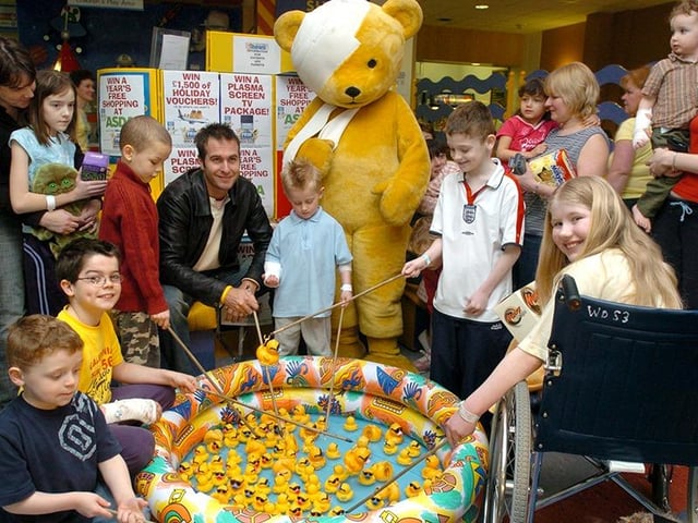 England Cricket captain Michael Vaughan pictured helping to launch the Children's Hospital plastic duck appeal with Theo the Bear, on March 23, 2005
