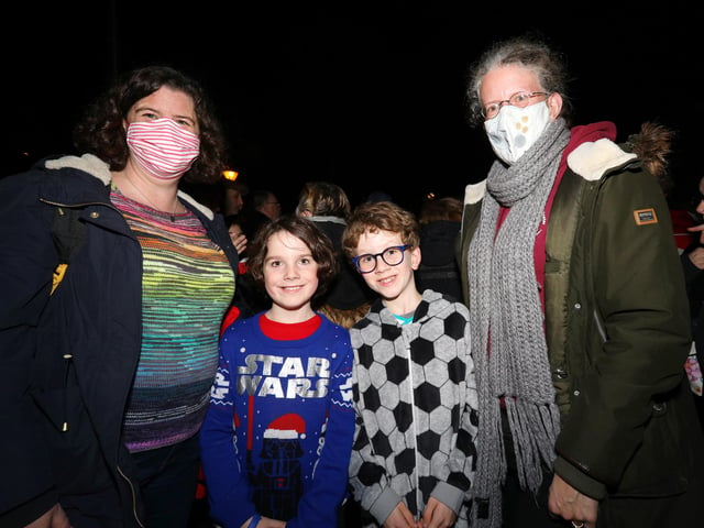 From left, Ruth Wilson, Ollie Wilson, 8, Oliver, 8, and Lysiane. The boys are best friends. Emsworth Christmas lights switch on, St Peter's Square, Emsworth
Picture: Chris Moorhouse (jpns 031221-39)
