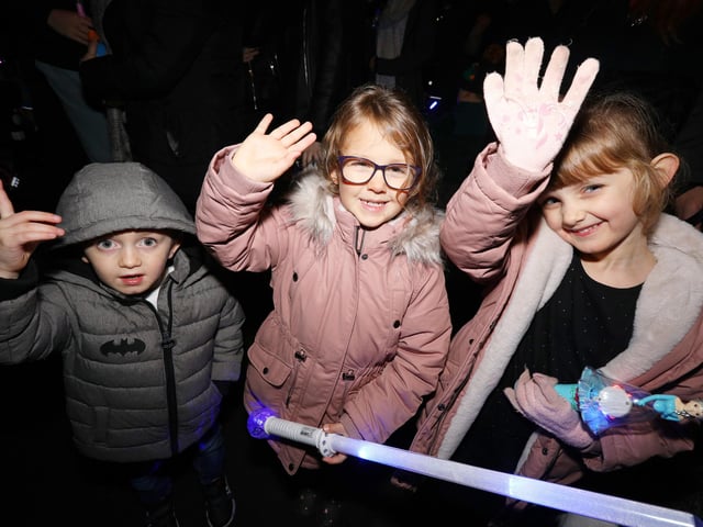 From left, Liam, 3, Lily, 5, and Maizie-Rose, 5. Emsworth Christmas lights switch on, St Peter's Square, EmsworthPicture: Chris Moorhouse   (jpns 031221-44)
