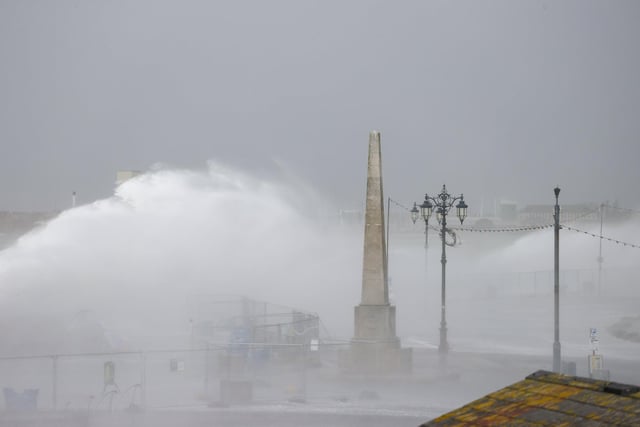 Southsea Seafront saw large waves crashing against the sea walls. Photos by Alex Shute