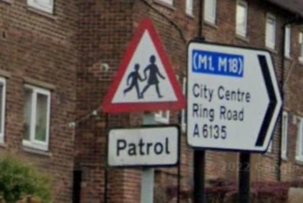 A Google Maps image of Birley Spa Lane, Sheffield, showing a school crossing patrol sign. Road safety campaigners want to see the signs changed to say there are schools nearby as there hasn't been a crossing patrol warden in place for four years as the job vacancy has not been filled