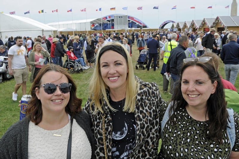 Crowds enjoy the D Day celebrations on Southsea Common: (l to r), Elly Cattermole, Gemma Braithwaite, and Alexis Purdy from Portsmouth. Picture: Ian Hargreaves (050619-26)